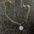 Gold Link Pearlized Evil Eye Necklace